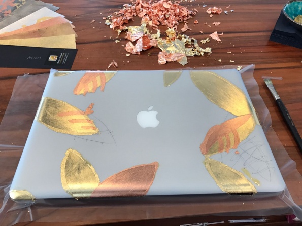 Laptop mit Gold